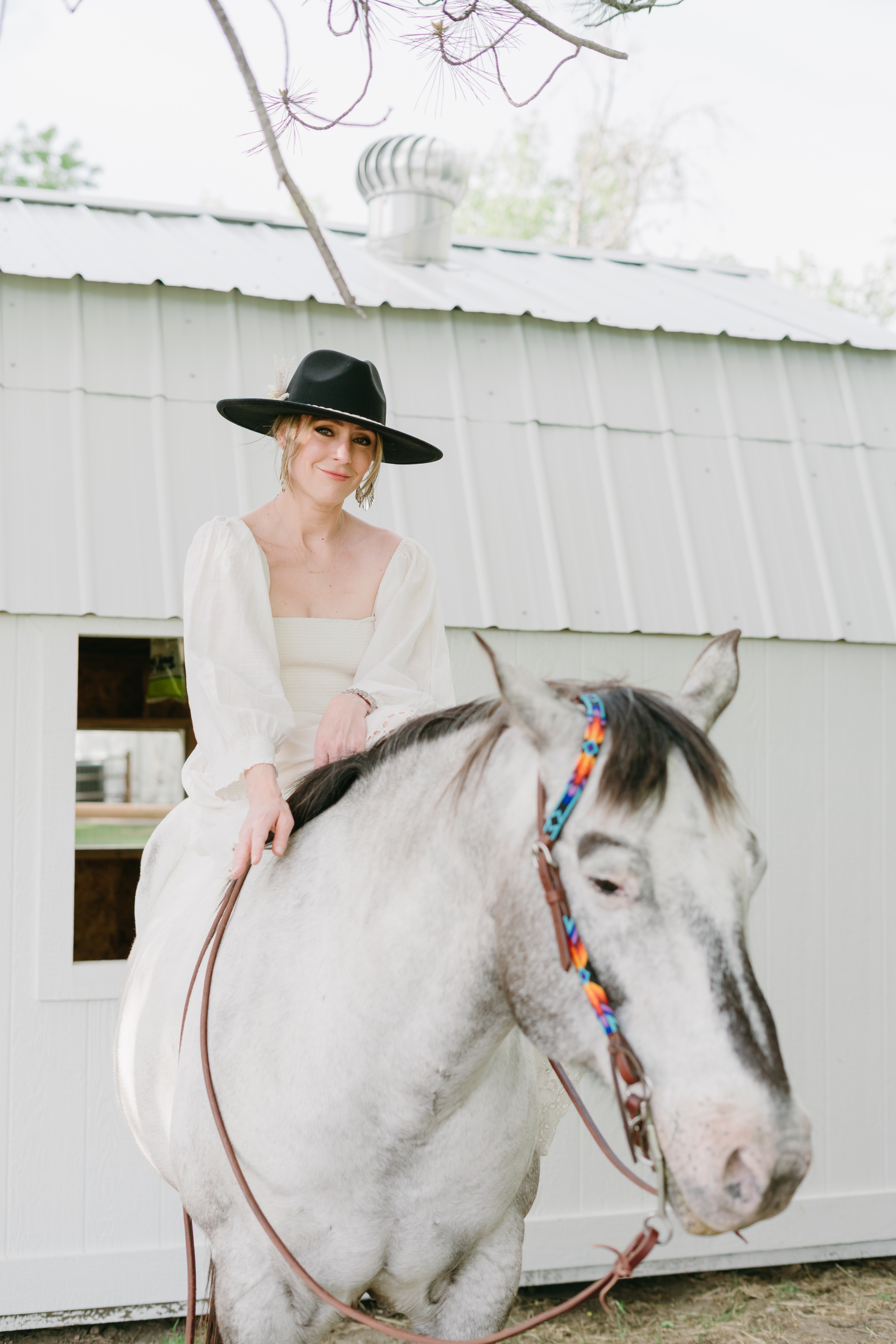 Lani Baron with horse at the barn